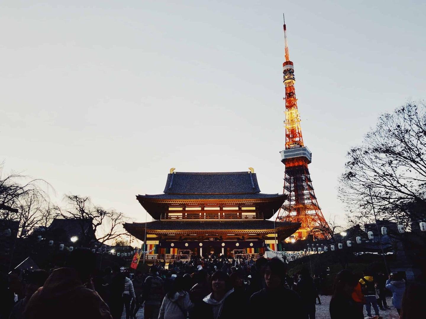 We went to Zōjō-ji to check out the New Year festivities last night. I love the architectural mix of old and new.