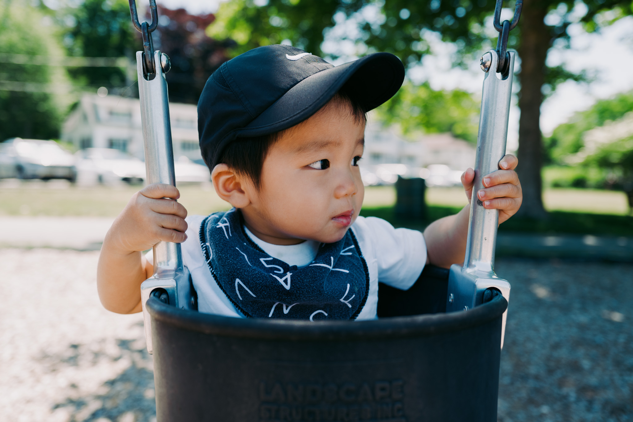 Baby J on a swing.