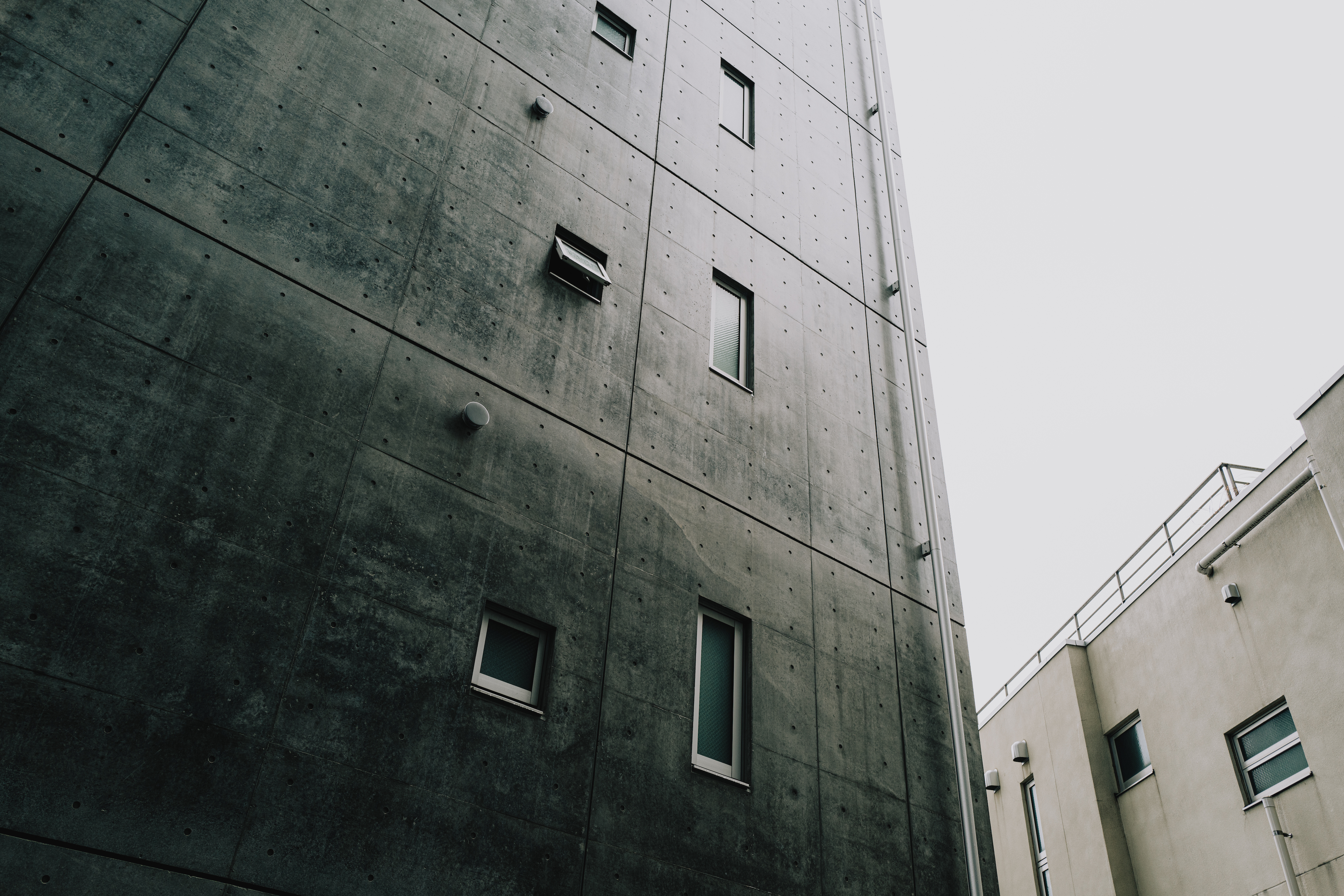 An exposed concrete apartment in Tokyo. Photographed with a Leica Q2.