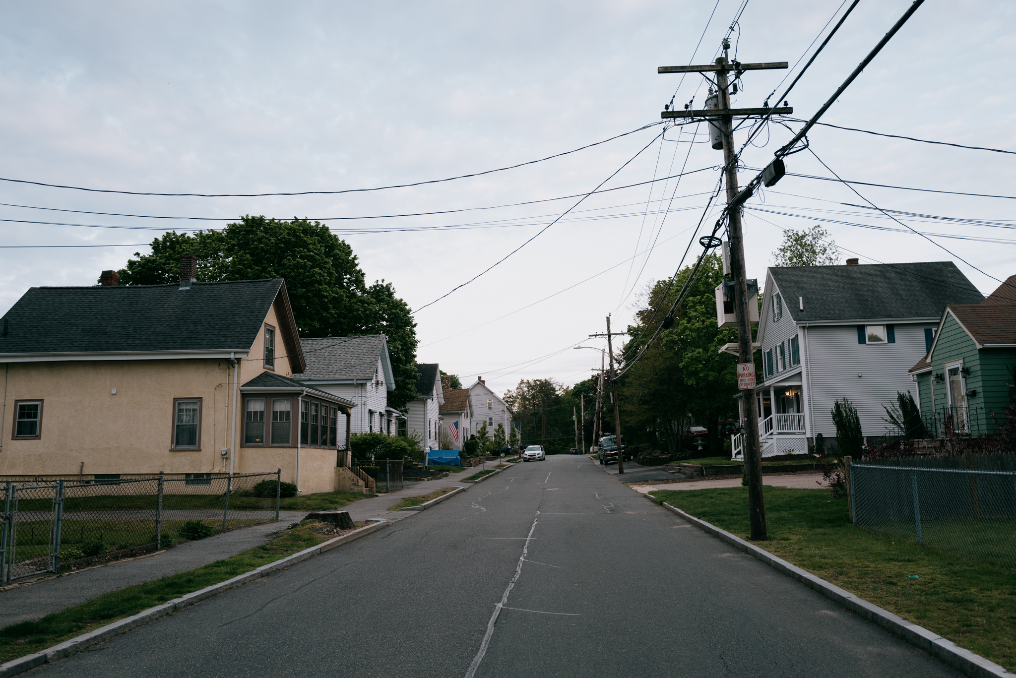 Houses in a suburban neighborhood in Massachusetts. Image captured with a Leica Q2